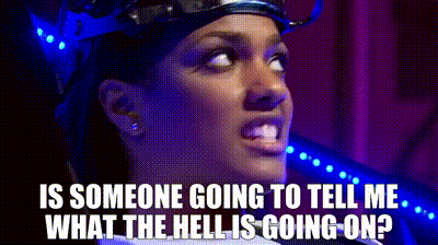 Woman With Crown Asking What The Hell Is Going On GIF