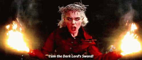 Woman With Crown Of Thorns Holding Sword GIF