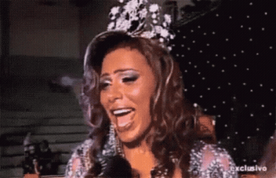 Woman With Crown Talking Into Microphone GIF