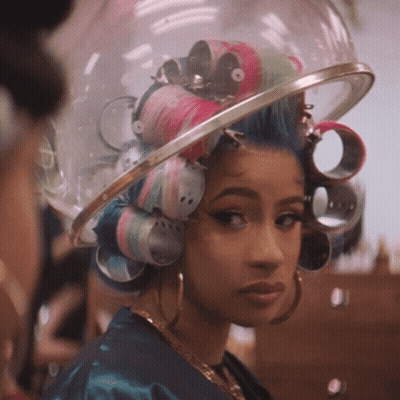 Woman With Curlers Wearing Helmet GIF