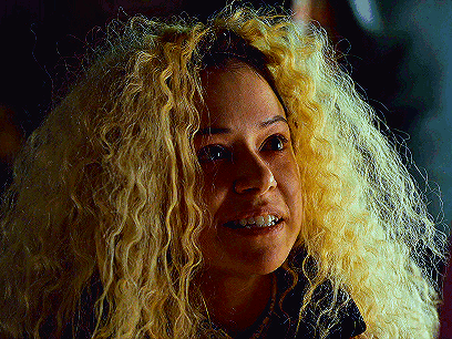 Woman With Curly Blonde Hair Smiling GIF