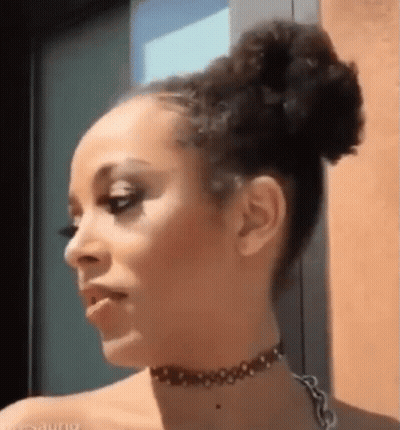 Woman With Curly Hair And Choker GIF