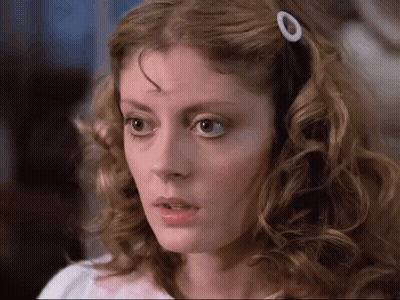 Woman With Curly Hair And Hair Clip GIF