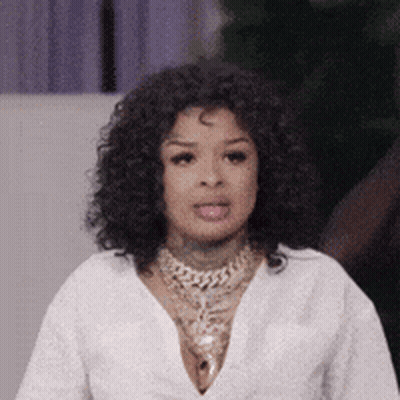 Woman With Curly Hair And Necklace GIF