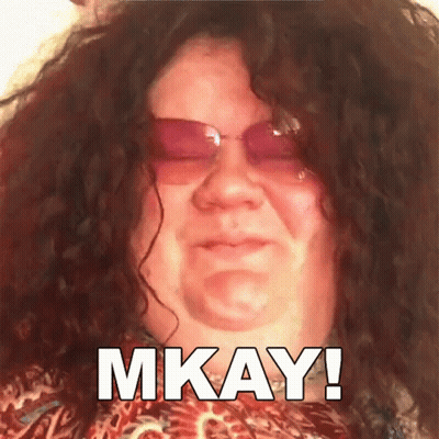 Woman With Curly Hair And Pink Sunglasses Says Mkay GIF