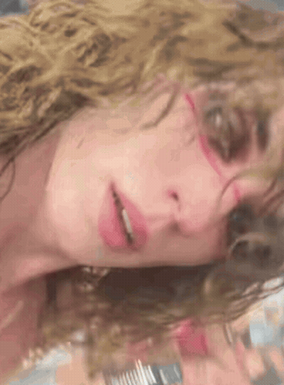 Woman With Curly Hair And Sunglasses GIF
