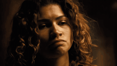 Woman With Curly Hair Funny Face GIF