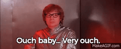 Woman With Curly Hair Glasses Hello Kitty Sweater GIF