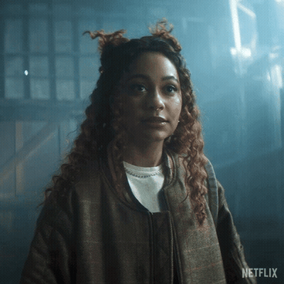 Woman With Curly Hair In Dark Room Netflix GIF