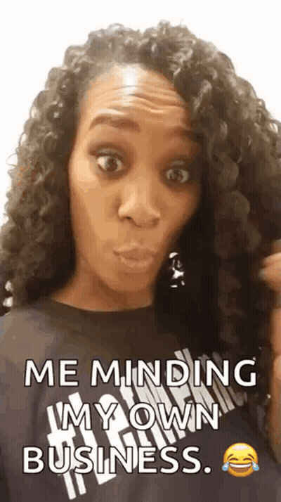 Woman With Curly Hair Making Funny Face GIF
