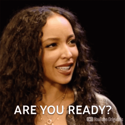 Woman With Curly Hair Saying Are You Ready GIF
