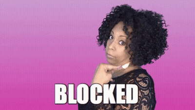 Woman With Curly Hair Saying Blocked GIF