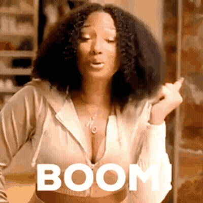 Woman With Curly Hair Saying Boom GIF