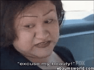 Woman With Curly Hair Saying Good Night GIF
