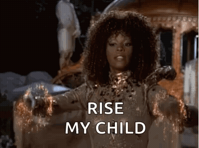 Woman With Curly Hair Saying Rise My Child GIF
