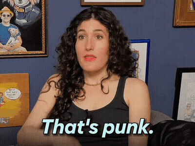 Woman With Curly Hair Says Punk GIF