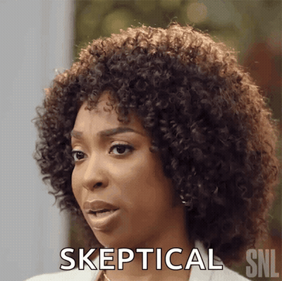 Woman With Curly Hair Skeptical Gesture GIF