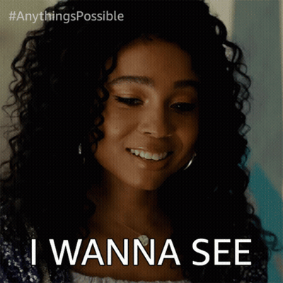 Woman With Curly Hair Smiling Saying I Wanna See GIF