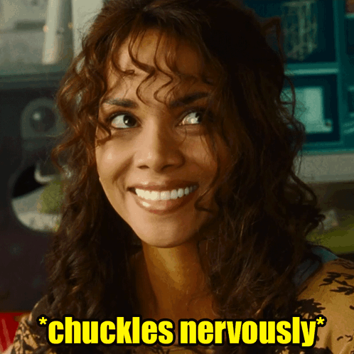Woman With Curly Hair Smiling With Words Chuckles Nervously GIF
