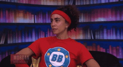 Woman With Curly Hair Sticking Tongue Out GIF