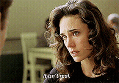 Woman With Curly Hair Talking To Man Says It Isn't Real GIF