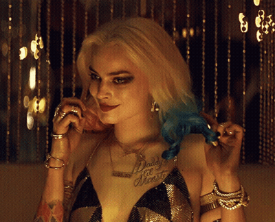 Woman With Daddy's Little Monster Chest Tattoo GIF