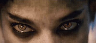Woman With Dark Eyeshadow Close Up GIF