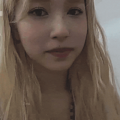 Woman With Dots On Eyelashes GIF