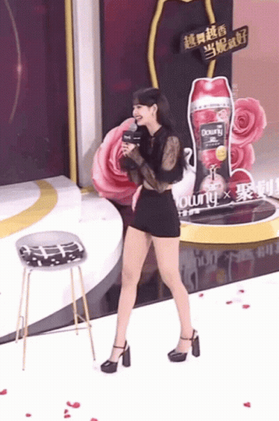 Woman With Downy Perfume Bottle GIF