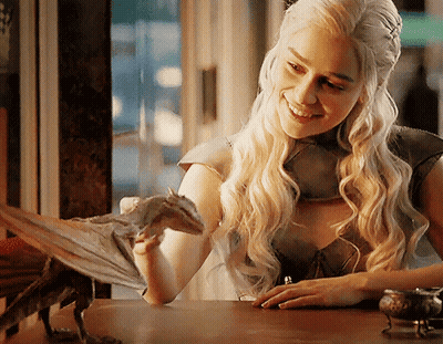 Woman With Dragon On Lap GIF