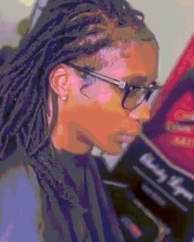 Woman With Dreadlocks Flexing Muscles In Black Shirt GIF