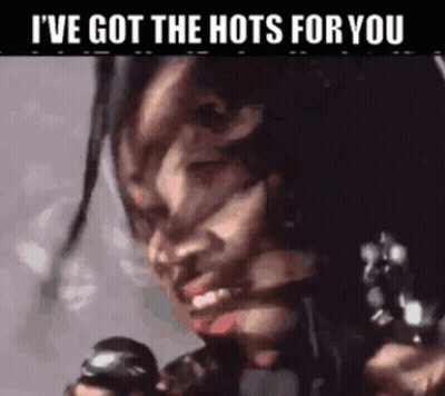Woman With Dreadlocks Holding Gun Says I've Got The Hots For You GIF