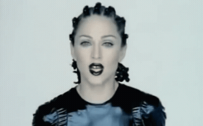 Woman With Dreadlocks Making Funny Face GIF