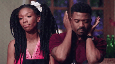 Woman With Dreadlocks Next To Man GIF