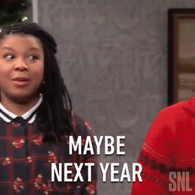 Woman With Dreadlocks Saying Maybe Next Year GIF