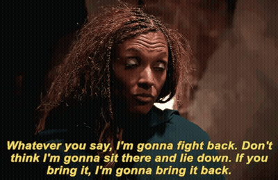 Woman With Dreadlocks Talking About Fighting Back GIF