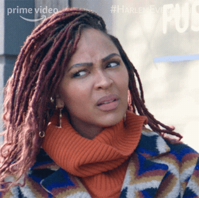 Woman With Dreadlocks Wearing Prime Video Sweater And Coat GIF