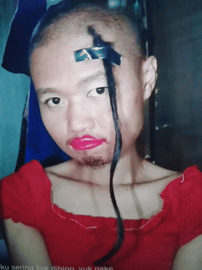 Woman With Duct Tape On Eyebrows And Lipstick GIF