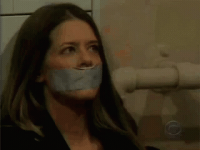 Woman With Duct Tape On Mouth GIF