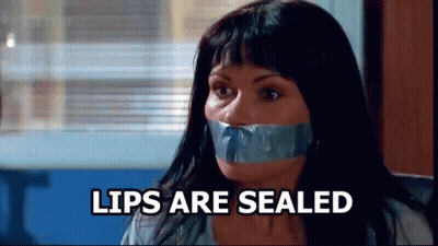 Woman With Duct Tape on Mouth Lips Are Sealed