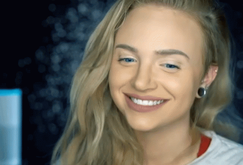 Woman With Ear Piercing Smiling GIF