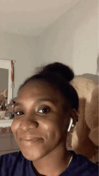 Woman With Earbuds And Teddy Bear GIF