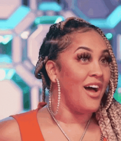 Woman With Earrings And Braids GIF