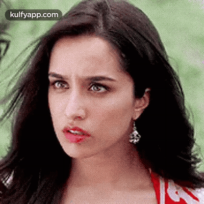 Woman With Earrings And Red Shirt GIF