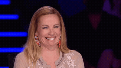 Woman With Earrings Smiling GIF