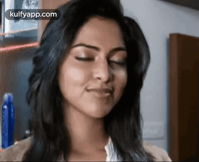 Woman With Eyes Closed GIF