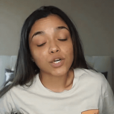 Woman With Eyes Closed And Open Mouth GIF
