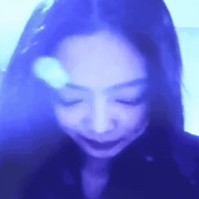 Woman With Eyes Closed Blue Background GIF