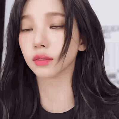 Woman With Eyes Closed GIF