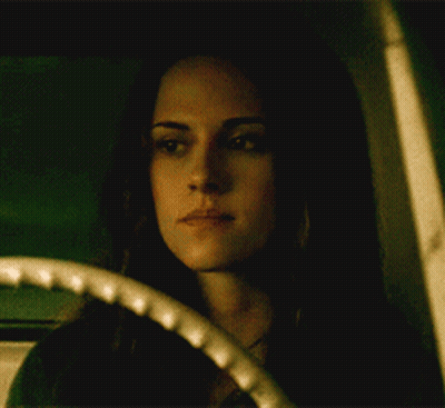 Woman With Eyes Closed Looking Out Window GIF